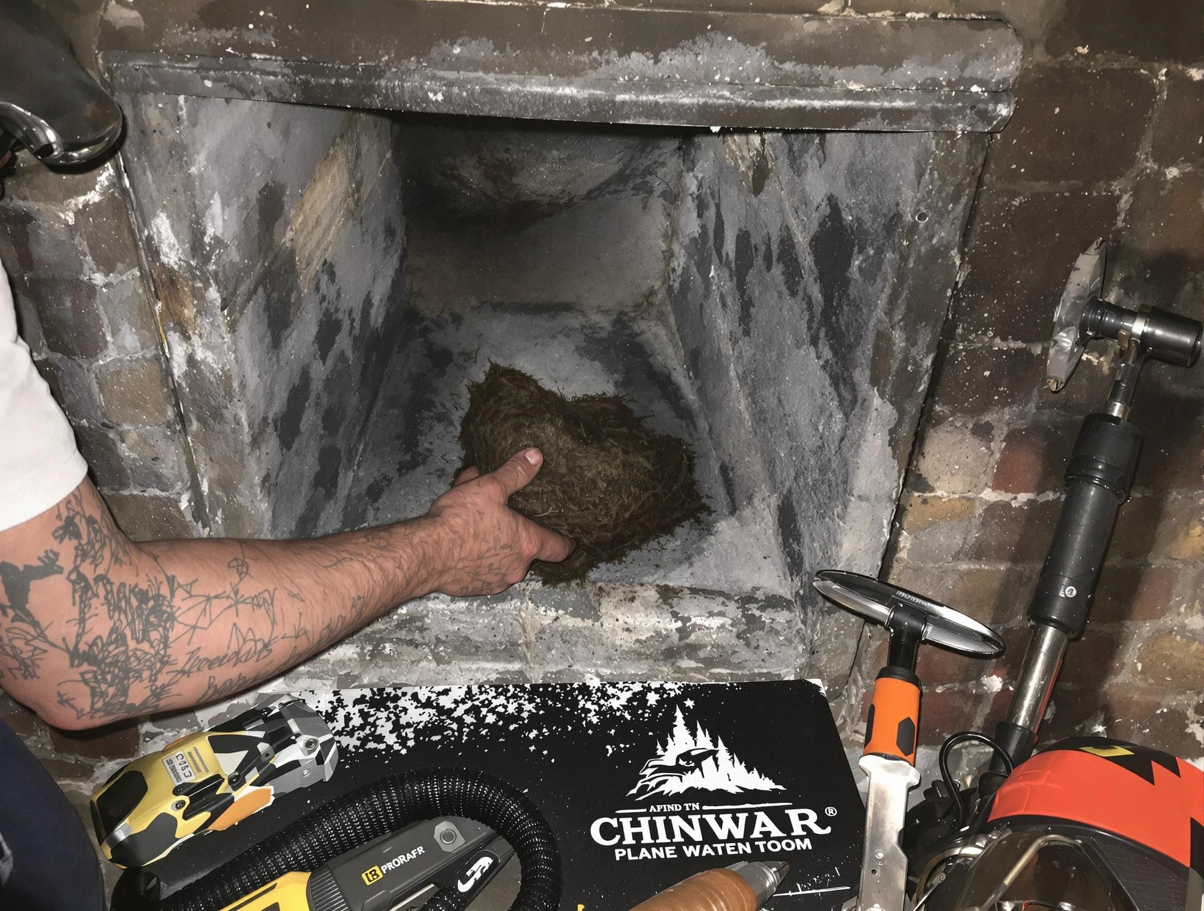 Pleasantville Chimney Sweep safely removing debris and screening chimney in Pleasantville, NJ